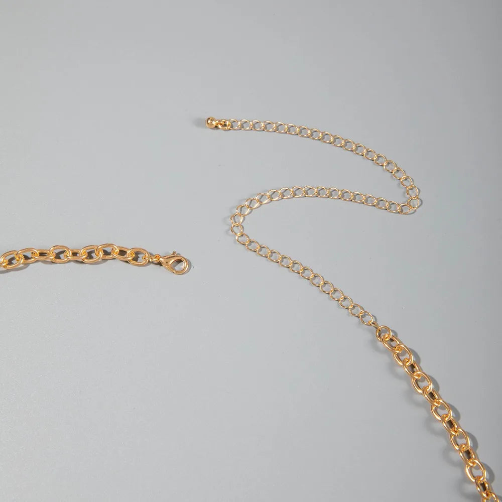 Chaîne de taille bohème d'été, pendentif en forme d'étoile de mer, coquillage, lien de taille ajouré, chaîne de corps pour bikini de plage pour femmes