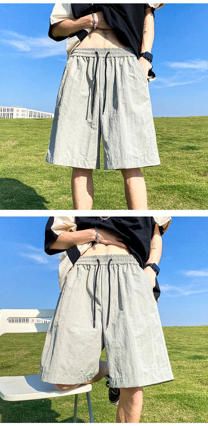 Pantalons courts pour hommes, pantalons décontractés d'été, pantalons à cordon de serrage, salopettes coréennes simples et polyvalentes, pantalons amples tendance pour hommes