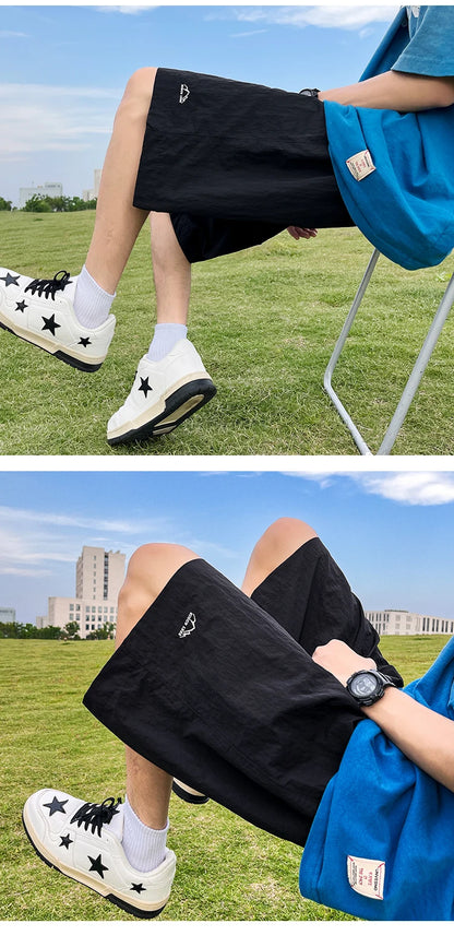 Pantalons courts pour hommes, pantalons décontractés d'été, pantalons à cordon de serrage, salopettes coréennes simples et polyvalentes, pantalons amples tendance pour hommes