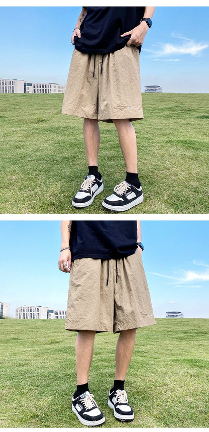 Pantalons courts pour hommes, pantalons décontractés d'été, pantalons à cordon de serrage, salopettes coréennes simples et polyvalentes, pantalons amples tendance pour hommes