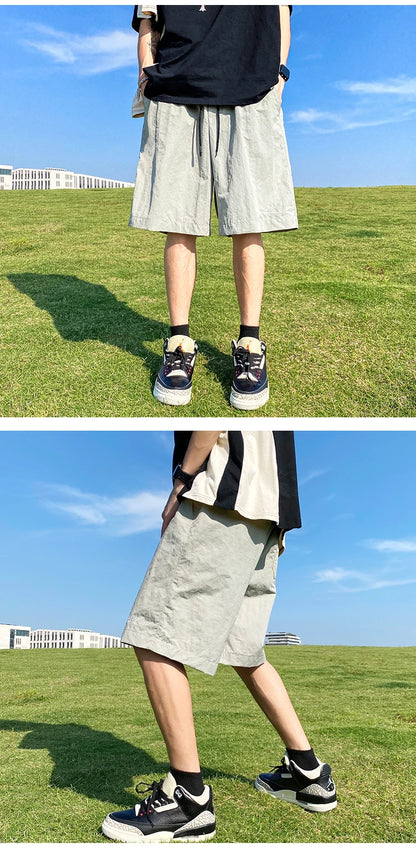 Pantalons courts pour hommes, pantalons décontractés d'été, pantalons à cordon de serrage, salopettes coréennes simples et polyvalentes, pantalons amples tendance pour hommes
