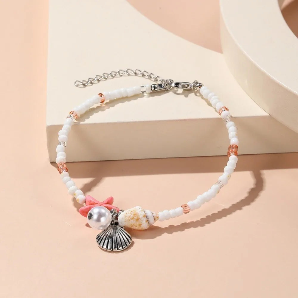 Chaîne de taille bohème d'été, pendentif en forme d'étoile de mer, coquillage, lien de taille ajouré, chaîne de corps pour bikini de plage pour femmes
