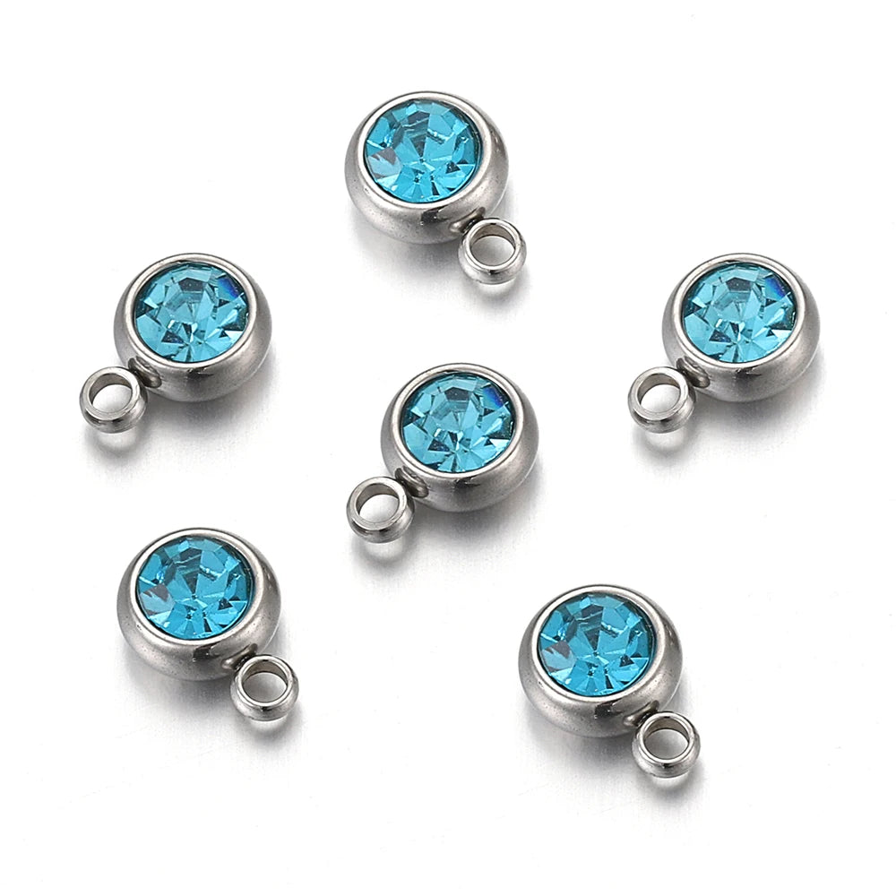 Lot de 20 breloques en acier inoxydable avec strass transparents et cristaux transparents pour la fabrication de bijoux, colliers, bracelets et autres accessoires.