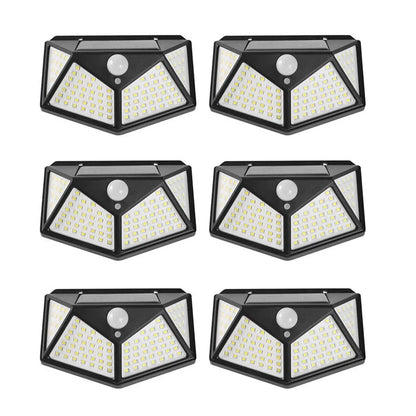 Lot de 1 à 6 lampes murales solaires à 100 LED 1800 mAh, 4 côtés lumineux, avec détecteur de mouvement, éclairage d'extérieur, idéal pour un jardin ou une cour.