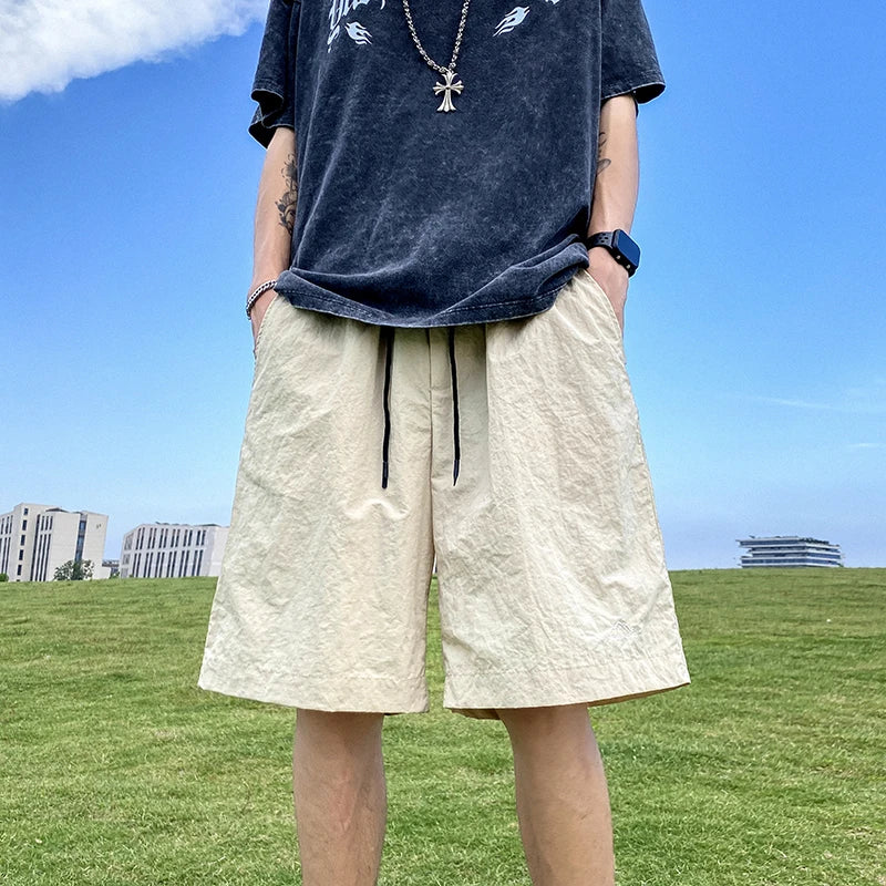 Pantalons courts pour hommes, pantalons décontractés d'été, pantalons à cordon de serrage, salopettes coréennes simples et polyvalentes, pantalons amples tendance pour hommes