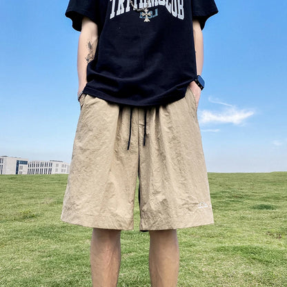 Pantalons courts pour hommes, pantalons décontractés d'été, pantalons à cordon de serrage, salopettes coréennes simples et polyvalentes, pantalons amples tendance pour hommes