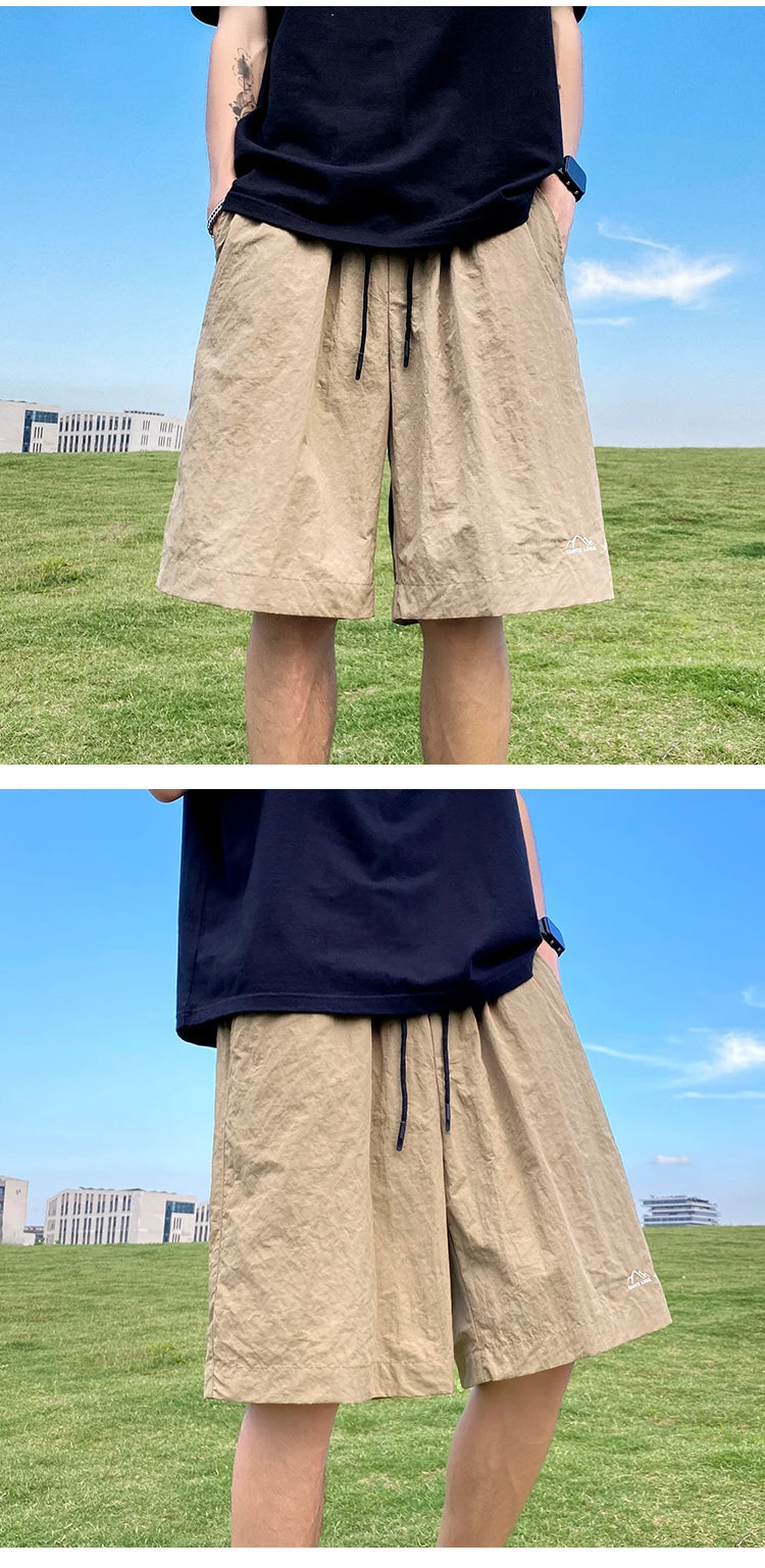 Pantalons courts pour hommes, pantalons décontractés d'été, pantalons à cordon de serrage, salopettes coréennes simples et polyvalentes, pantalons amples tendance pour hommes