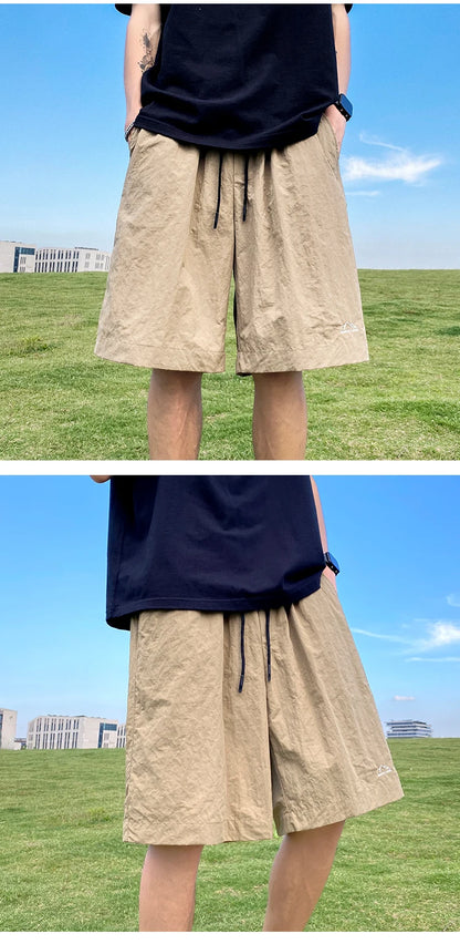 Pantalons courts pour hommes, pantalons décontractés d'été, pantalons à cordon de serrage, salopettes coréennes simples et polyvalentes, pantalons amples tendance pour hommes