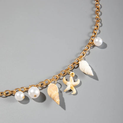Chaîne de taille bohème d'été, pendentif en forme d'étoile de mer, coquillage, lien de taille ajouré, chaîne de corps pour bikini de plage pour femmes