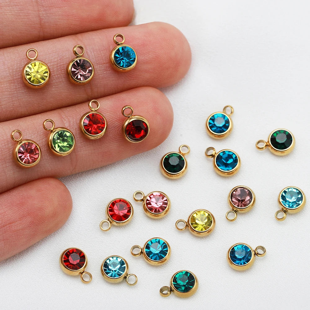 Lot de 20 breloques en acier inoxydable avec strass transparents et cristaux transparents pour la fabrication de bijoux, colliers, bracelets et autres accessoires.