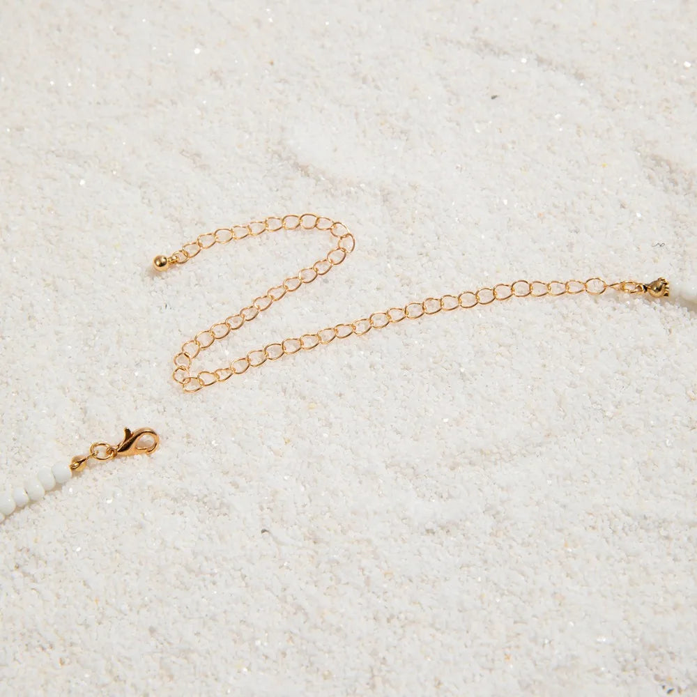 Chaîne de taille bohème d'été, pendentif en forme d'étoile de mer, coquillage, lien de taille ajouré, chaîne de corps pour bikini de plage pour femmes