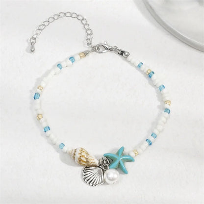 Chaîne de taille bohème d'été, pendentif en forme d'étoile de mer, coquillage, lien de taille ajouré, chaîne de corps pour bikini de plage pour femmes