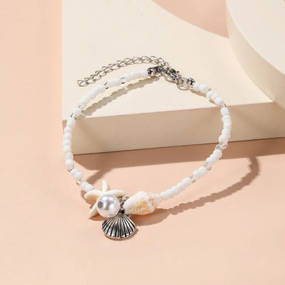 Chaîne de taille bohème d'été, pendentif en forme d'étoile de mer, coquillage, lien de taille ajouré, chaîne de corps pour bikini de plage pour femmes