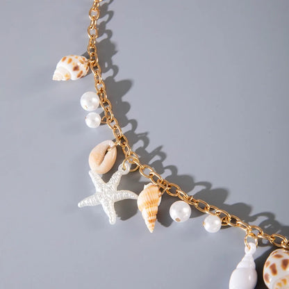 Chaîne de taille bohème d'été, pendentif en forme d'étoile de mer, coquillage, lien de taille ajouré, chaîne de corps pour bikini de plage pour femmes