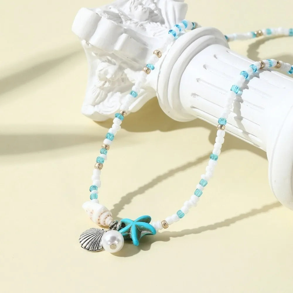 Chaîne de taille bohème d'été, pendentif en forme d'étoile de mer, coquillage, lien de taille ajouré, chaîne de corps pour bikini de plage pour femmes