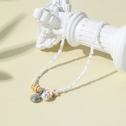 Chaîne de taille bohème d'été, pendentif en forme d'étoile de mer, coquillage, lien de taille ajouré, chaîne de corps pour bikini de plage pour femmes
