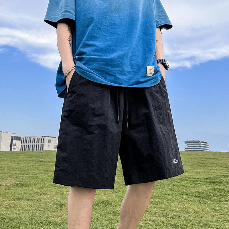 Pantalons courts pour hommes, pantalons décontractés d'été, pantalons à cordon de serrage, salopettes coréennes simples et polyvalentes, pantalons amples tendance pour hommes