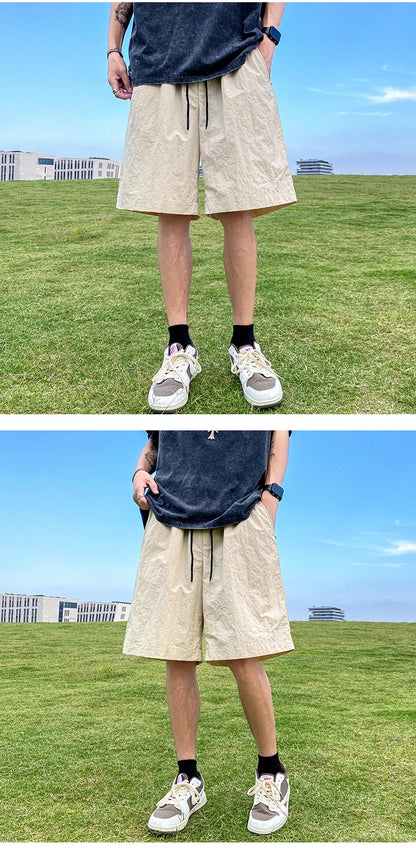Pantalons courts pour hommes, pantalons décontractés d'été, pantalons à cordon de serrage, salopettes coréennes simples et polyvalentes, pantalons amples tendance pour hommes